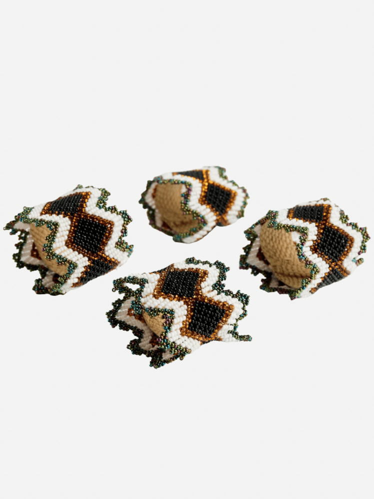 Image may contain Accessories Bead Cuff Earring and Jewelry