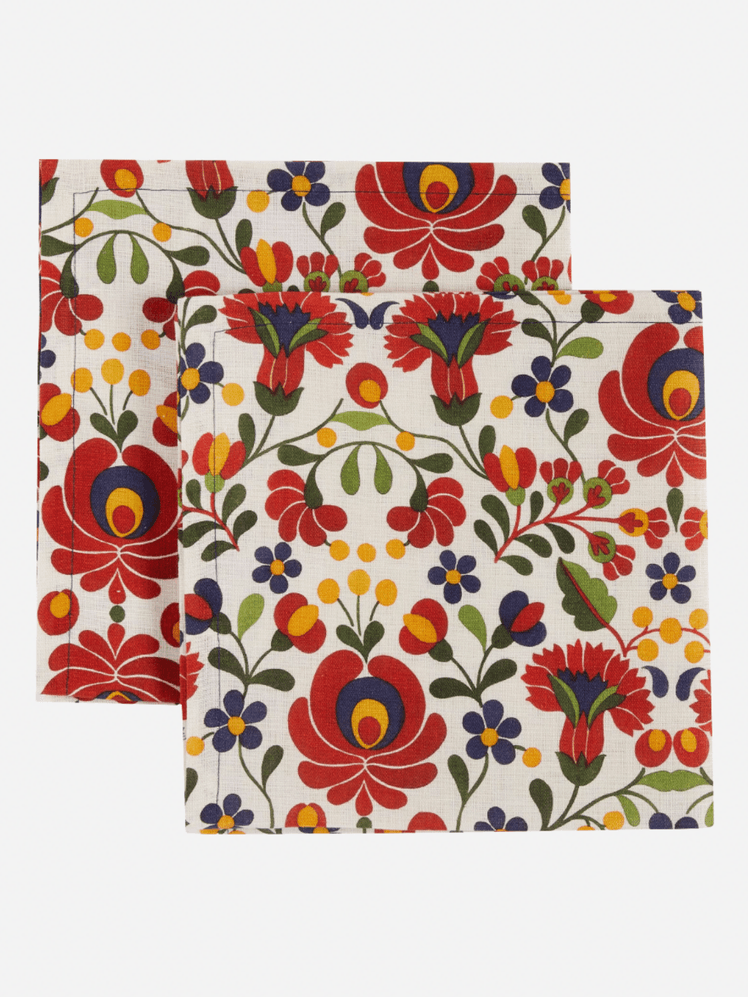 Image may contain Home Decor Rug Art Floral Design Graphics Pattern Accessories Bag and Handbag